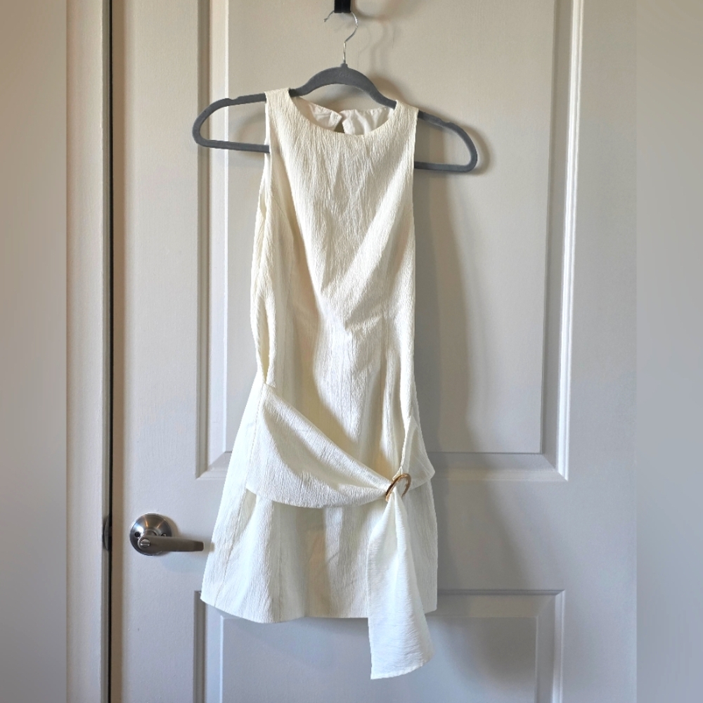 Elegant Cream Textured Sleeveless Dress